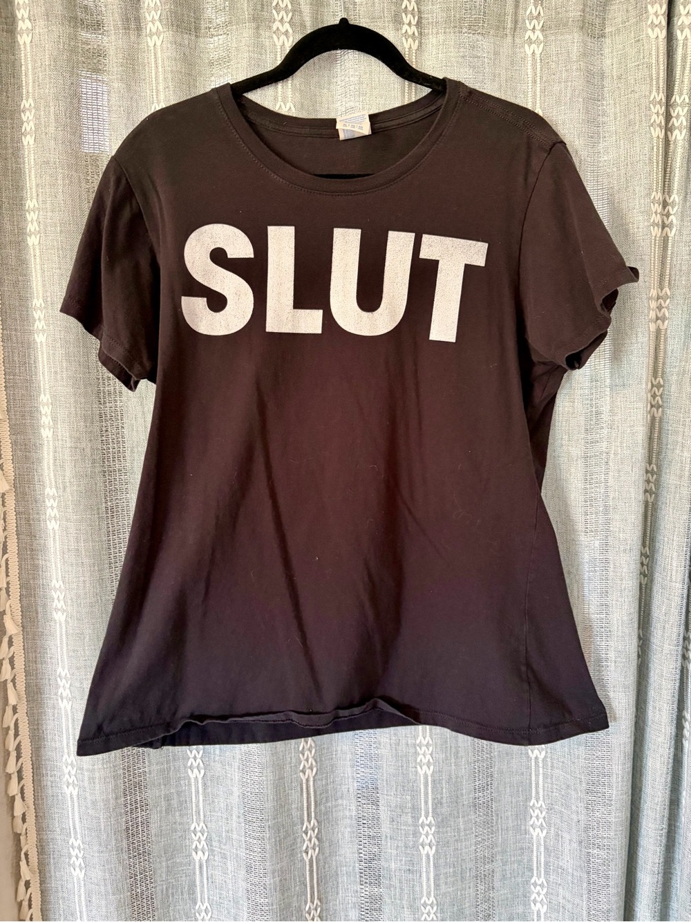 Black Tee with bold lettering